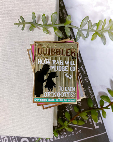 “Quibbler” Enamel Pin